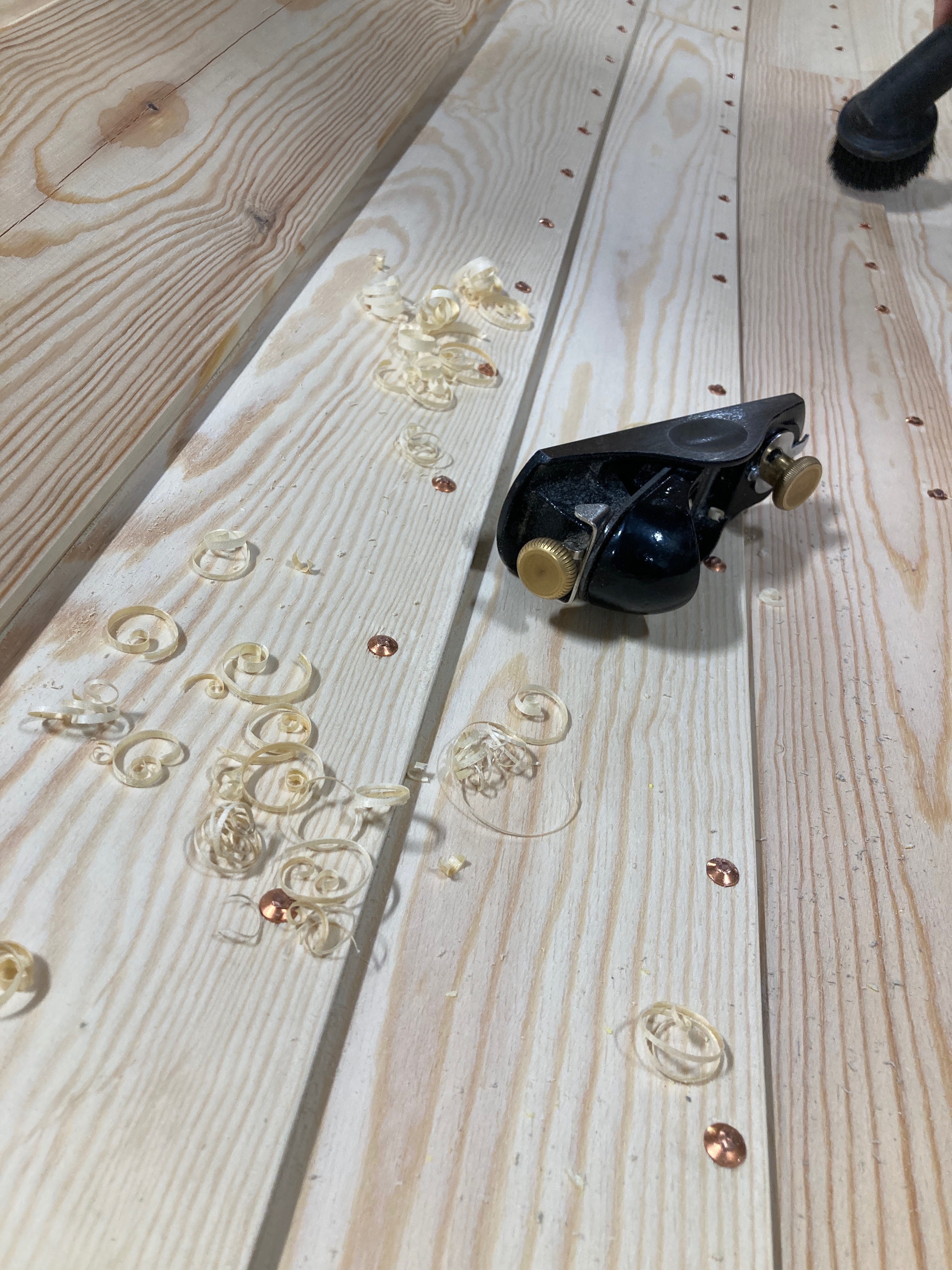 Even though the parts have been milled into shape, shavings are still produced when planing the bevels. Shavings